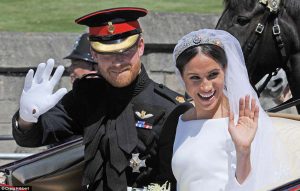 4C7149E300000578-5748651-Meghan_and_Harry_wave_to_royal_fans_during_their_open_top_proces-a-4_1526801822389