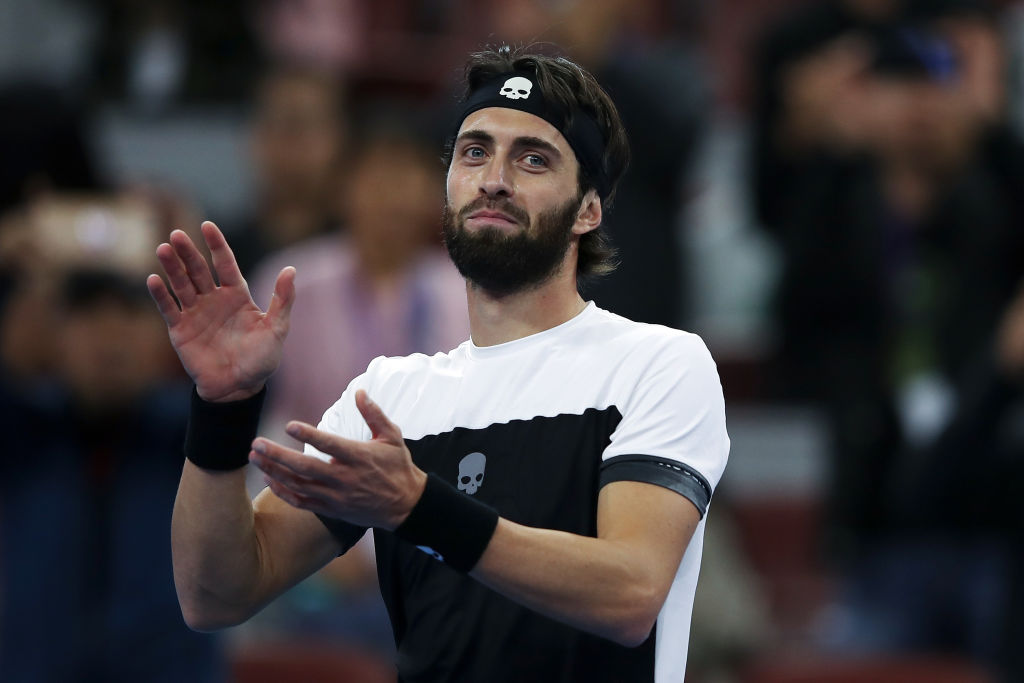 BEIJING, CHINA - OCTOBER 07:  Nikoloz Basilashvili of Georgia celebrates after winning his Men's Singles Finals match against Juan Martin Del Potro of Argentina in the 2018 China Open at the China National Tennis Center on October 7, 2018 in Beijing, China.  (Photo by Lintao Zhang/Getty Images)