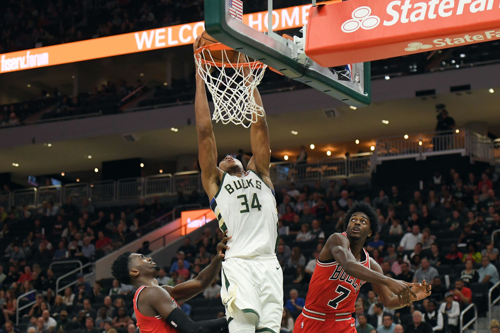 MILWAUKEE, WI - OCTOBER 03:  Giannis Antetokounmpo #34 of the Milwaukee Bucks dunks against the Chicago Bulls during the first half of a preseason game at the Fiserv Forum on October 3, 2018 in Milwaukee, Wisconsin. NOTE TO USER: User expressly acknowledges and agrees that, by downloading and or using this photograph, User is consenting to the terms and conditions of the Getty Images License Agreement.  (Photo by Stacy Revere/Getty Images)