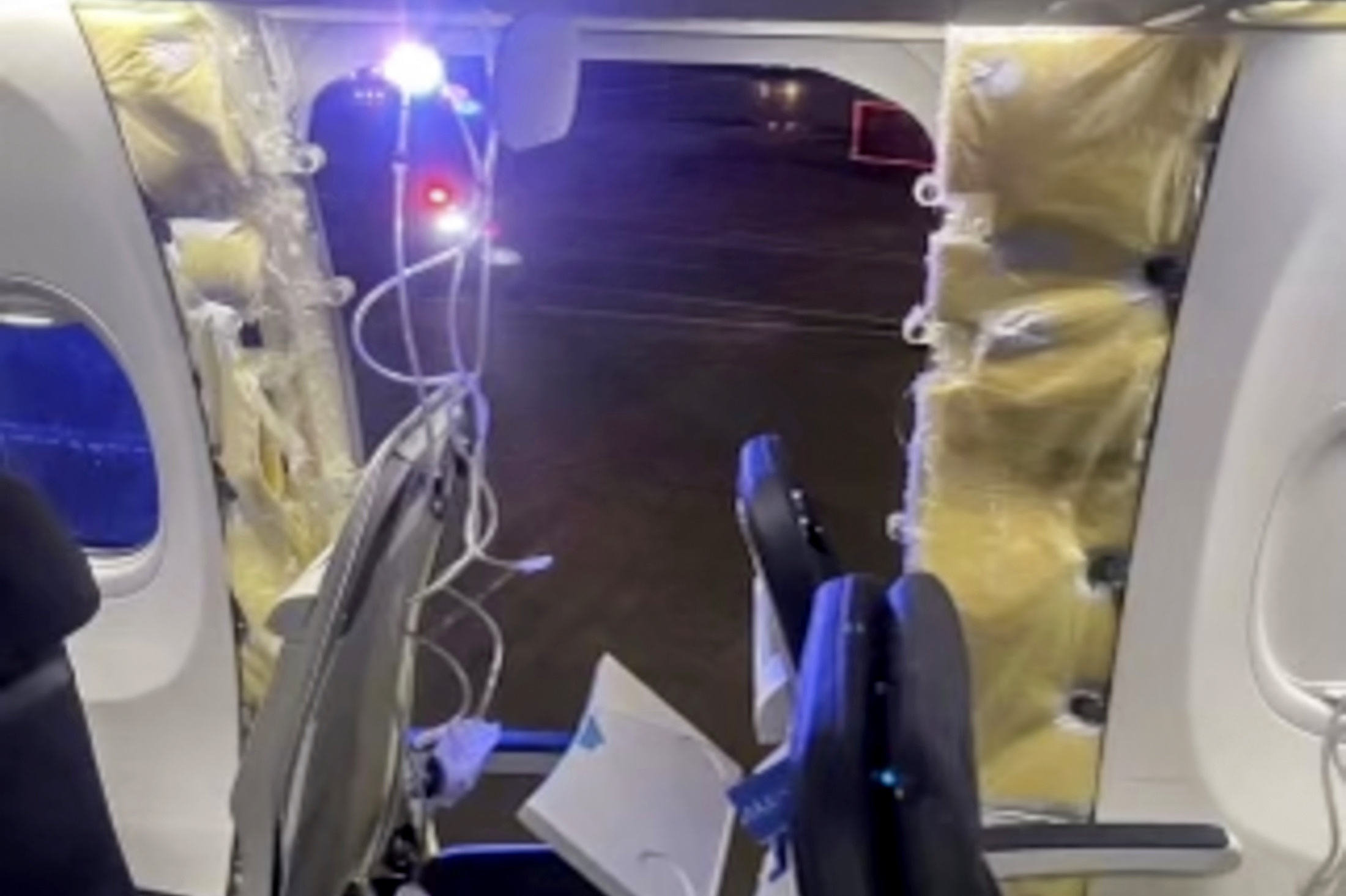 CORRECTS TO 2024, NOT 2023 – This photo provided by an unnamed source shows the damaged part of an Alaska Airlines Boeing 737 Max 9, Flight 1282, which was forced to return to Portland International Airport on Friday, Jan. 5, 2024. (The Oregonian via AP)