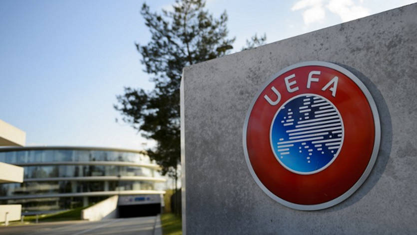 A photo taken on April 6, 2016 shows the logo of European football body UEFA at the UEFA headquarters in Nyon. Swiss police raided the headquarters of European football body UEFA on April 6 following the latest revelations of a web of Panama-based offshore financial dealings by the rich and famous. The raid came after the so-called Panama Papers revealed that newly elected FIFA president Gianni Infantino signed TV rights contracts for the Champions League with a company headed by two defendants later caught up in the corruption scandal that engulfed football's world body. / AFP PHOTO / FABRICE COFFRINI