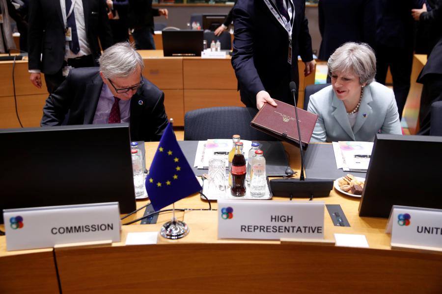 Theresa May agrees on Brexit divorce deal after all-night talks with the EU