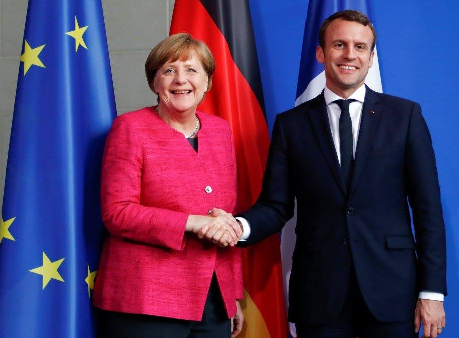 Merkel, Macron delay plan to present euro zone reforms: Spiegel