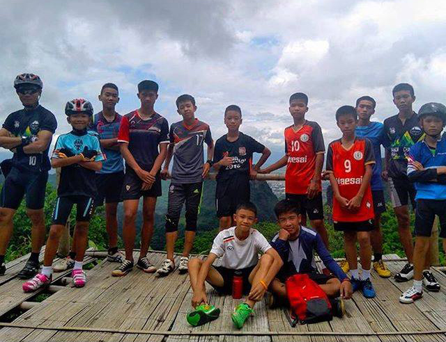 Who are boys and their coach trapped in Thai cave?