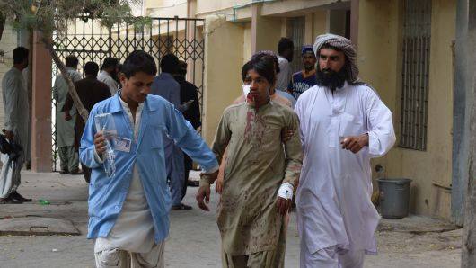 Pakistan bombing: At least 128 killed in explosion ahead of elections