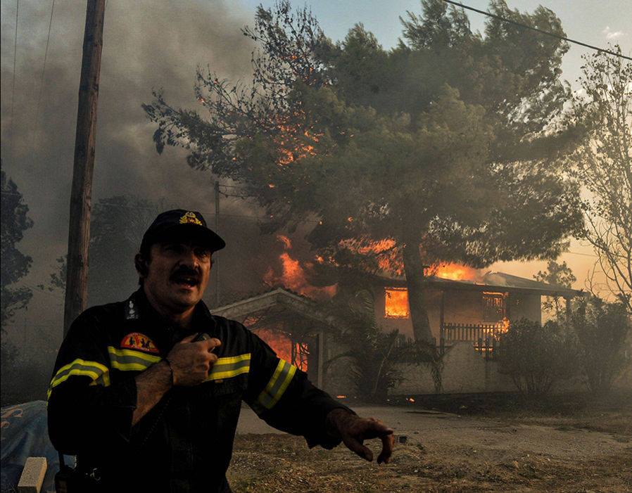 Greece wildfires: Death toll rises to 79 after 'biblical disaster' as rescuers search charred homes