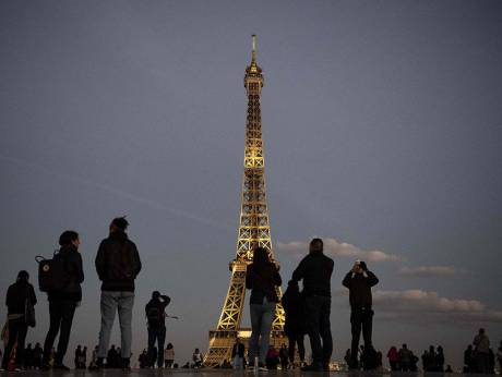 Eiffel Tower illuminated as homage to Charles Aznavour