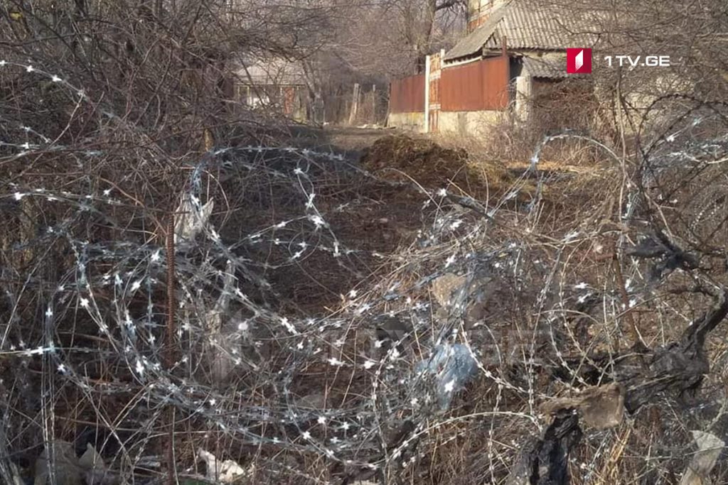 Russian soldiers install barbed wires in Khurvaleti village
