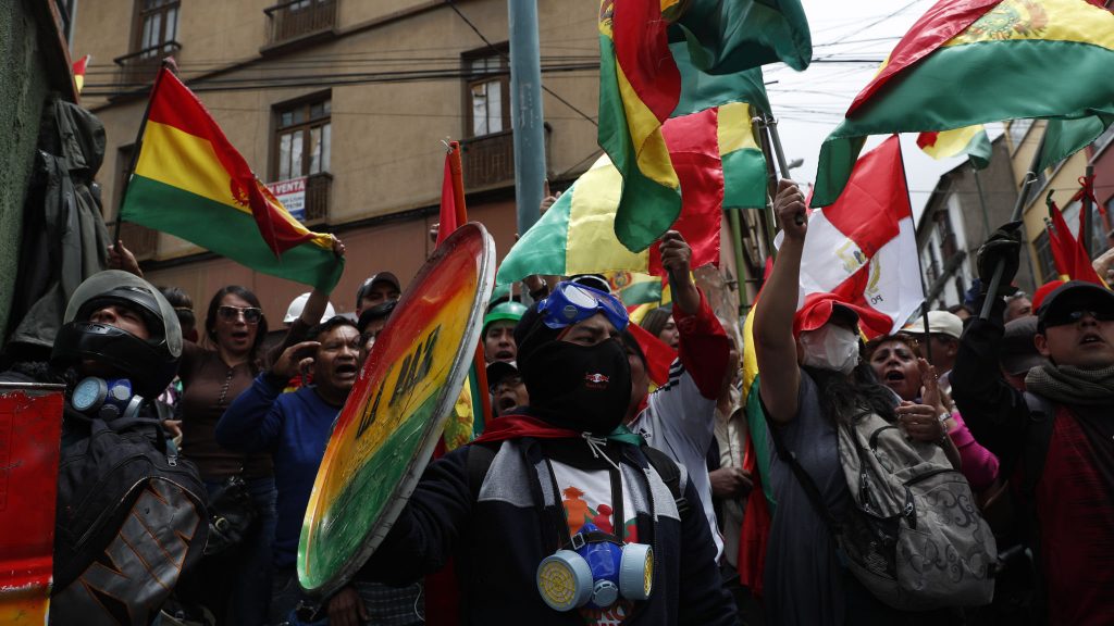 Anti-Morales protesters in Bolivia force state-run media off air