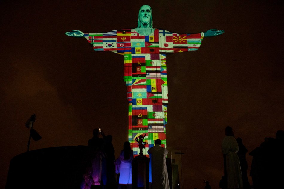 Rio's Christ the Redeemer statue illuminated to show countries with COVID-19