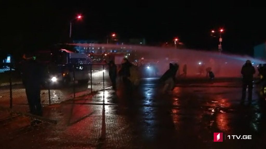 Police used water cannons near the CEC building, protesters throw stones at law enforcers