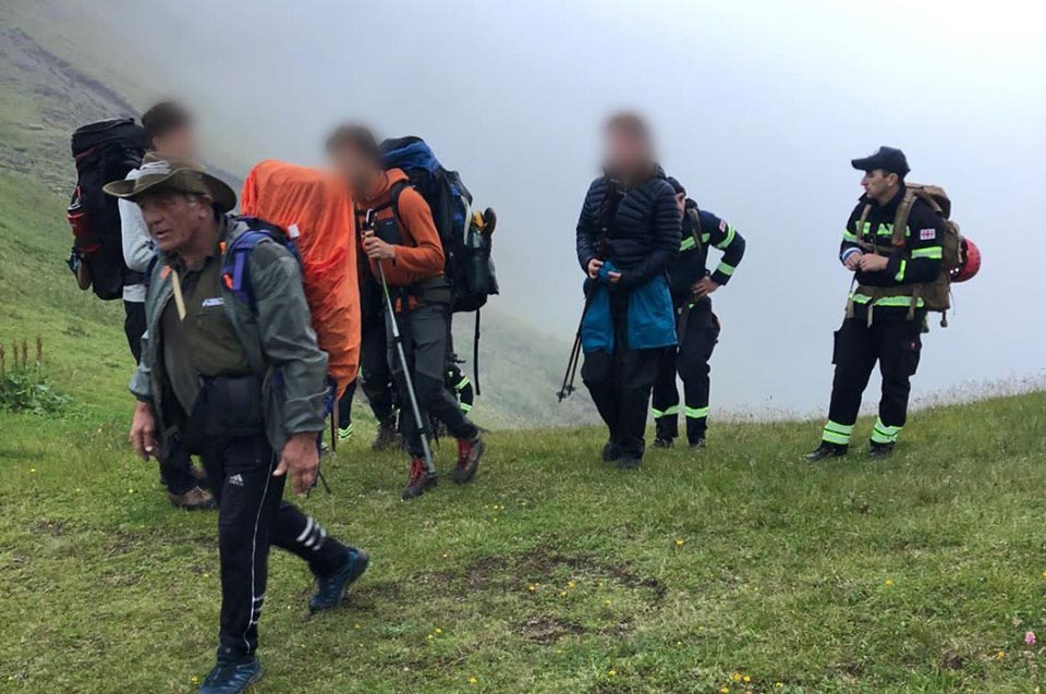Rescuers assist two foreign hikers