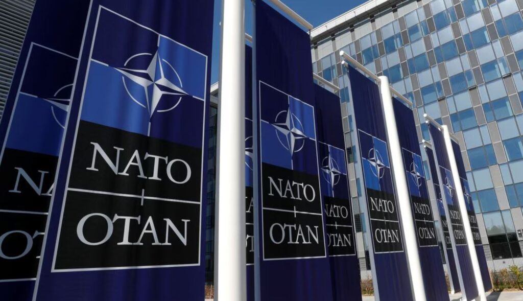 НАТО асаммит акоммиунике  -  2008 шықәсатәи Бухаресттәи асаммит аҿы иҳадаҳкылаз аӡбара шьақәҳарҕәҕәоит, Қырҭтәыла Алианс алахәылас иҟалоит,  ауснагӡатәқәа рплан  ари апроцесс иузалымхуа хәҭоуп