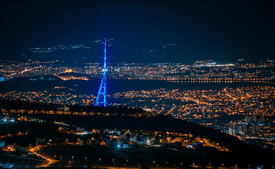 Tbilisi TV Tower, Peace of Bridge light up in EU flag colors