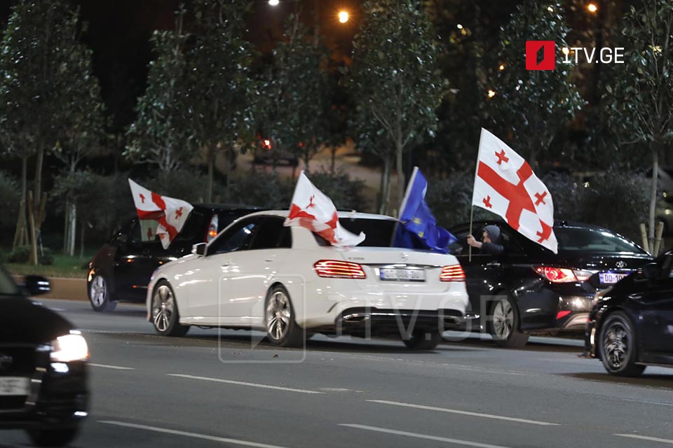 Georgians fill streets to celebrate EU candidate status 