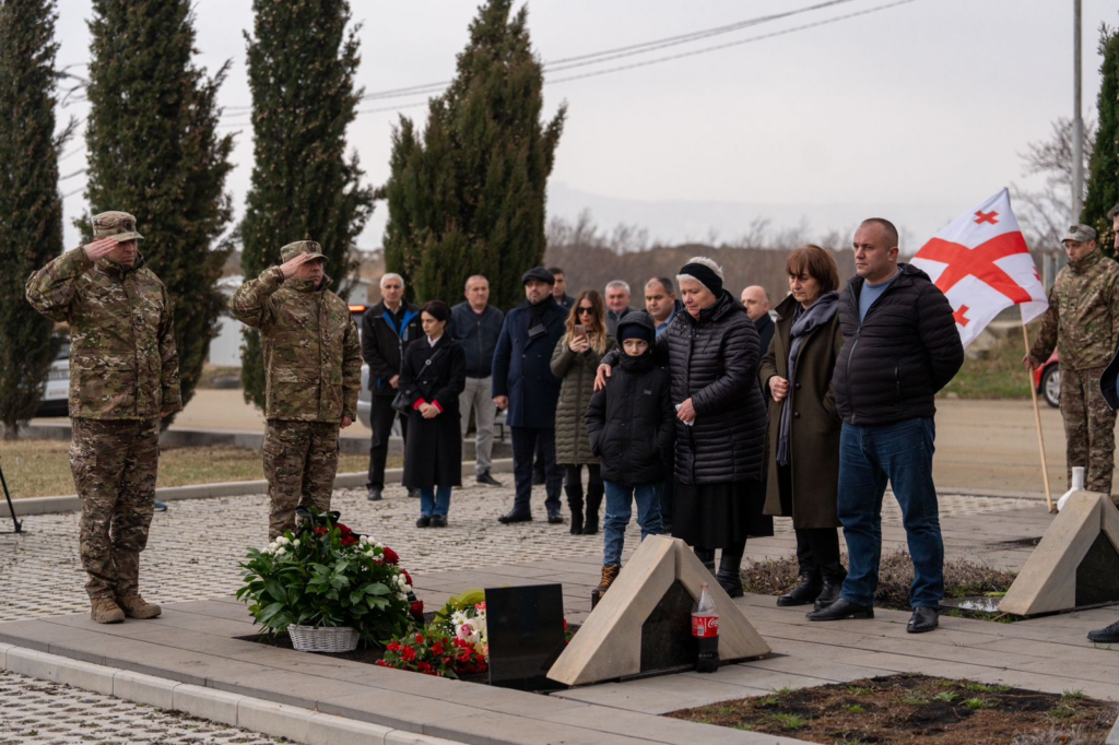 Military personnel commemorate Archil Tatunashvili at Mukhatghedi Brothers' cemetery
