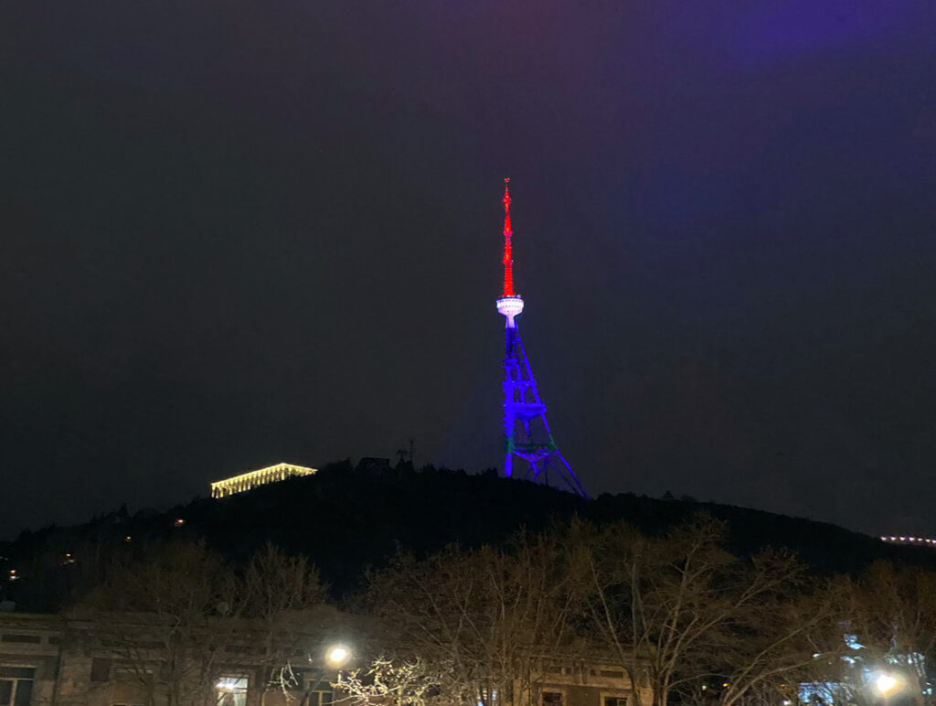 Tbilisi TV Tower illuminated in colours of Dominican Republic's flag