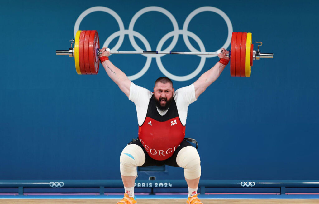 Weightlifter Lasha Talakhadze becomes three-time Olympic Champion 