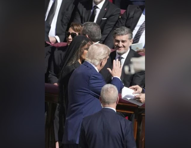Associated Press Photo: President Donald Trump waves to Georgia's President Mikheil Kavelashvili