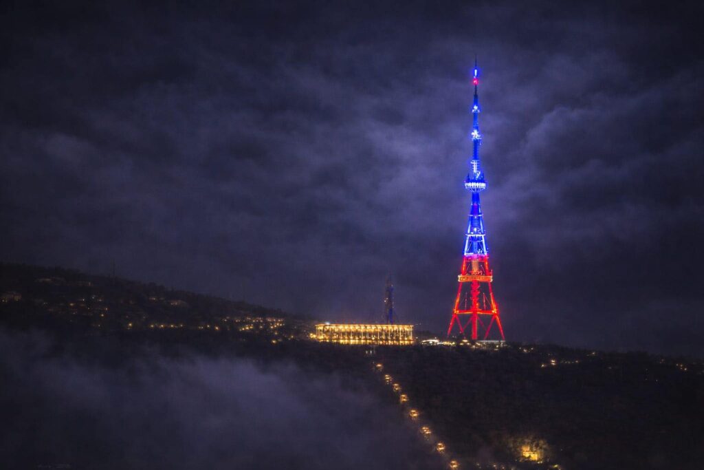 Tbilisi TV Tower illuminates in flag colors of Dominican Republic