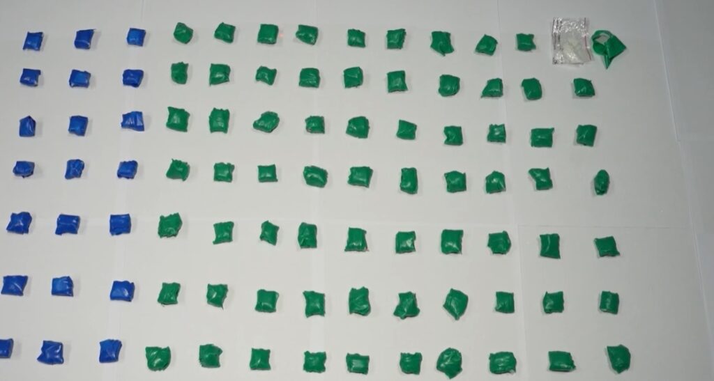 Police seize 107 packages of drugs and detain two individuals