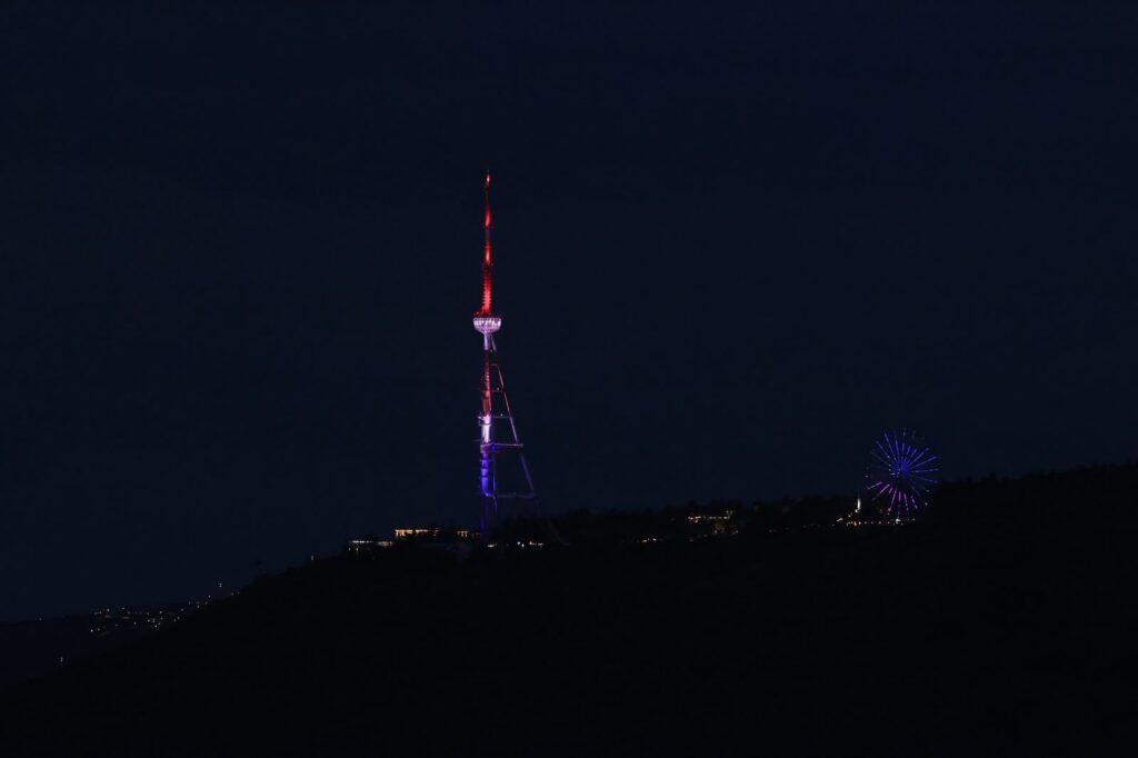 Tbilisi TV Tower illuminated in U.S. flag colors 