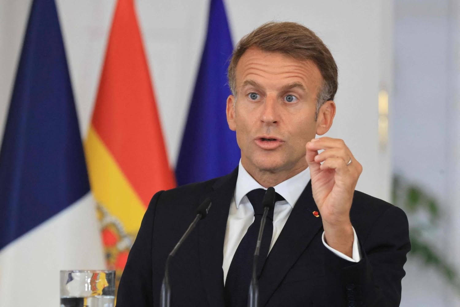 France's President Emmanuel Macron gestures during a joint press conference with Spain's Prime Minister Pedro Sanchez at the Moncloa Palace in Madrid on September 30, 2026. French President Emmanuel Macron is on his second day of a two-day state visit to Spain. (Photo by Ludovic MARIN / AFP)